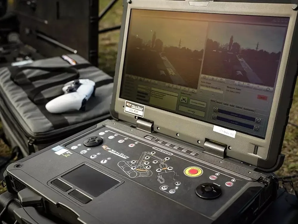 Tracked demining robot operated remotely through a control laptop