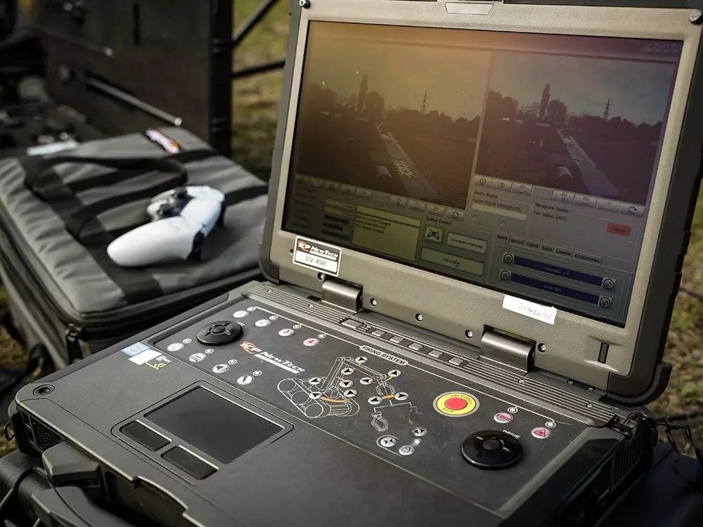 Tracked demining robot operated remotely through a control laptop